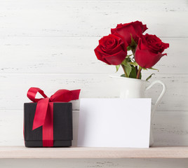 Valentines day card with gift and flowers