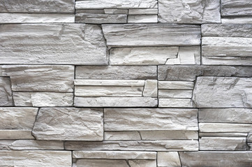 Texture of gray facade stone for exterior decoration of the house.