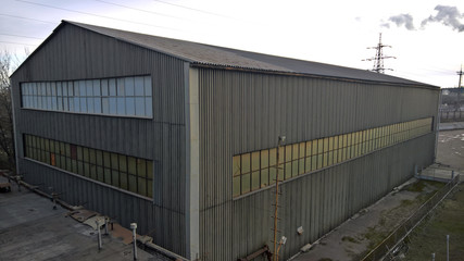 Fototapeta na wymiar metal facade of the building. windows and roof