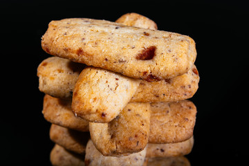 Hazelnut biscuits on the dark background