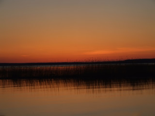 Colorful sunset over Karelian lake