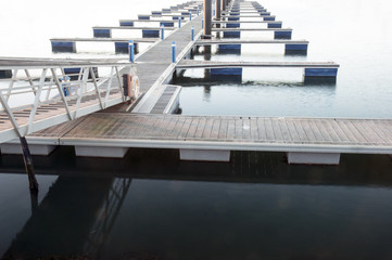 Access to Pantalan from an empty marina in winter lonely urban or marine landscape of non-tourist time