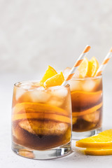 Orange iced coffee. Selective focus, space for text.