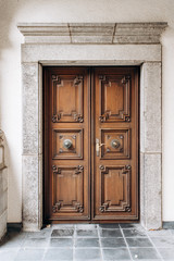 Fototapeta na wymiar Old wooden door. Old double wooden door in the building