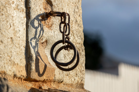 Pillory with justice balance and sword on the main square in Mariana, Minas Gerais, Brazil