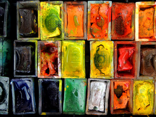 Box with watercolor paint. Selective focus. View from the top