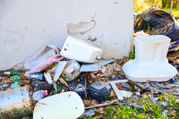 Illegal landfill. Landfill on the grass, concept of ecological disaster and pollution