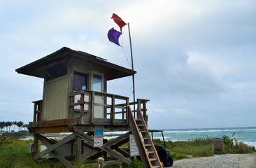 flag on mast lifeguard tower
