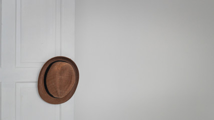 The Hat with on the white door white background