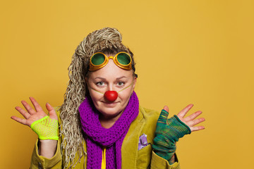 Smiling woman psychologist in clown costume for performance in childrens hospis. Real people portrait