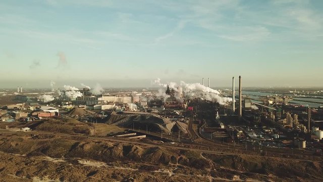 Aerial view of factory Tata Steel with smoking chimneys in IJmuiden, the Netherlands