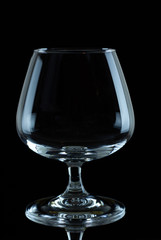  glass for whiskey and brandy empty on a black background