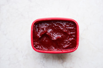 Very hot asian pepper sauce in a box