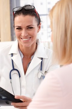 Close up portrait of female doctor with patient