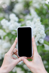 woman taking photo with mobile cell phone