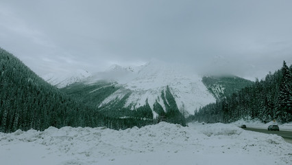 Snow capped mountains along Trans-Canada Highway in Banff National Park in Alberta, Canada