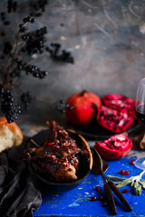 Fototapeta na wymiar quail in pomegranate sauce..style vintage