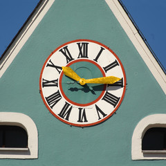 Clock at gable of the town hall  building in Eschenbach in der Oberpfalz, Germany