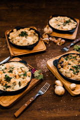 Baked potatoes with cheese.