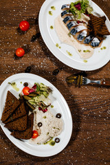 Plates with herring and bacon