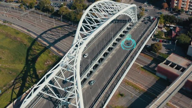 Autonomous Self Driving Car Concept. Aerial view of Electric car moving on city bridge with Artificial Intelligence scans road with sensors and GPS tracking. Future Transportation concept