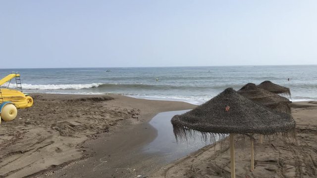 Marbella bech after heavy rains from the evening. Strong water rain took sand from the bech to the sea. the growing problem of global warming. Wild storms increasingly destroy coastal destinations.
