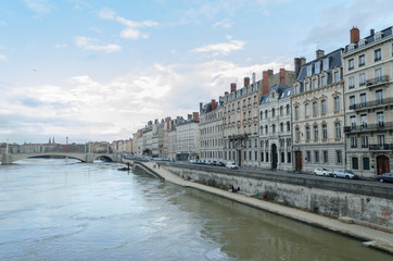 Fototapeta na wymiar Typical Building of Lyon City facing Saona River