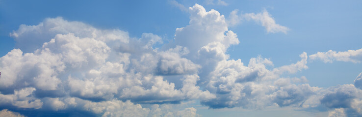 Blue sky background with white tiny clouds. Sky panorama