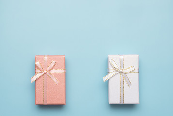 Romantic concept for Valentine`s Day. Flat lay. gift boxes on a blue background. Romantic concept. Copy Space