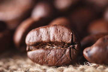 close-up roasted coffee beans look likes delicious