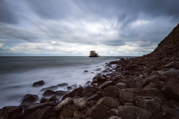 Longexposure landscape, seascape with sunken ship