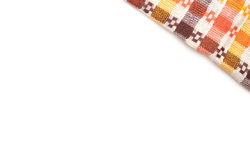 Tablecloth fabric on white background. Napkin or picnic textile.