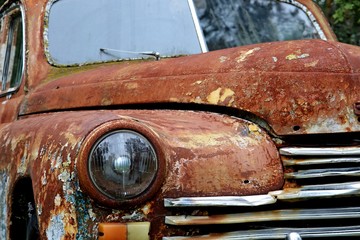 rusty car on the yard