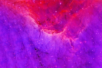 Pink nebula with stars and galaxies. Unusual shape. Elements of this image were furnished by NASA.