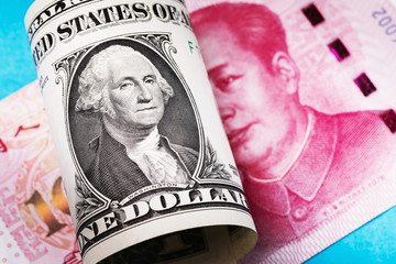 One dollar against a hundred yuan, close-up