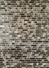 Gray brick textured wall od building full frame background 