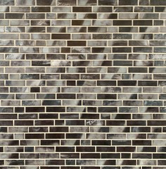 Gray brick texture wall of building