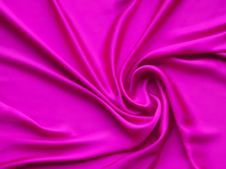 Pink smooth elegant luxurious satin background texture close up - abstracted wallpaper