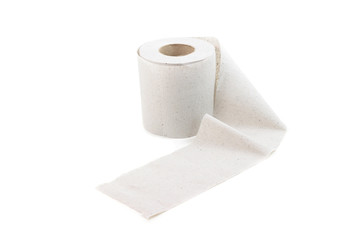 slightly unwound toilet paper on a white background