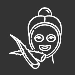 Face sheet mask chalk white icon on black background. Female spa treatment. Healthy skincare with plant extract. Medicinal herbs products. Vegan cosmetic. Isolated vector chalkboard illustration