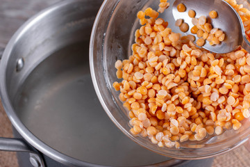 Cooking soup. Peas in a bowl in a soup