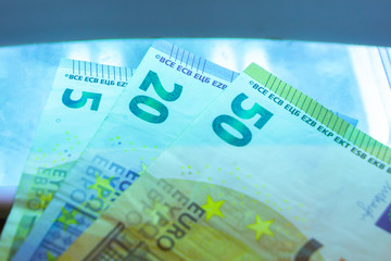 An authentication of paper euro banknotes with infrared or ultraviolet light detector.