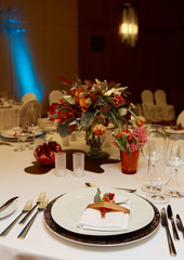 catering table set service with silverware, napkin and glass at restaurant before party