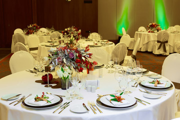 Table setting with fork, knife, plates and glass