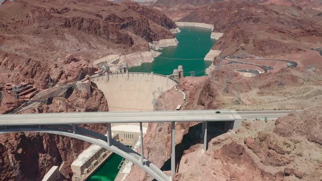 Hoover Dam. Nevada, Arizona, USA. The view over the territory of hydroelectric power station infrastructure. Memorial bridge or Bypass bridge; Lake Mead - the largest reservoir in USA; Colorado River