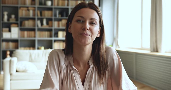 Woman applicant look at webcam conference calling for job interview