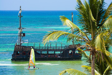 Pirate ship on the coast of Caribbean island, Punta Cana, Dominican Republic