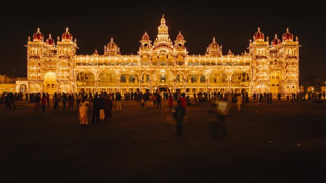 India, Karnataka, Mysore, City Palace, illuminated at dusk - time lapse