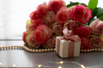 fresh rose flowers on gray