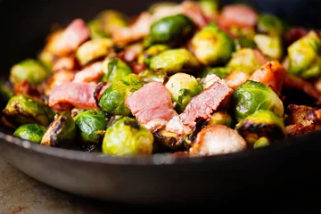 Fototapeten rustic pan roasted brussels sprouts with bacon © fkruger